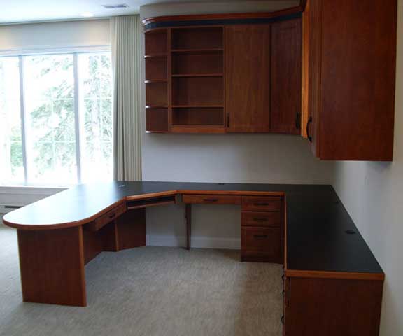 Home office with wall cabinets