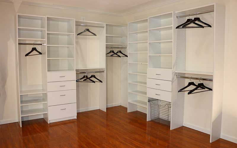 White Walk in Closet with Hanging units,Custom Doors and Drawer Fronts